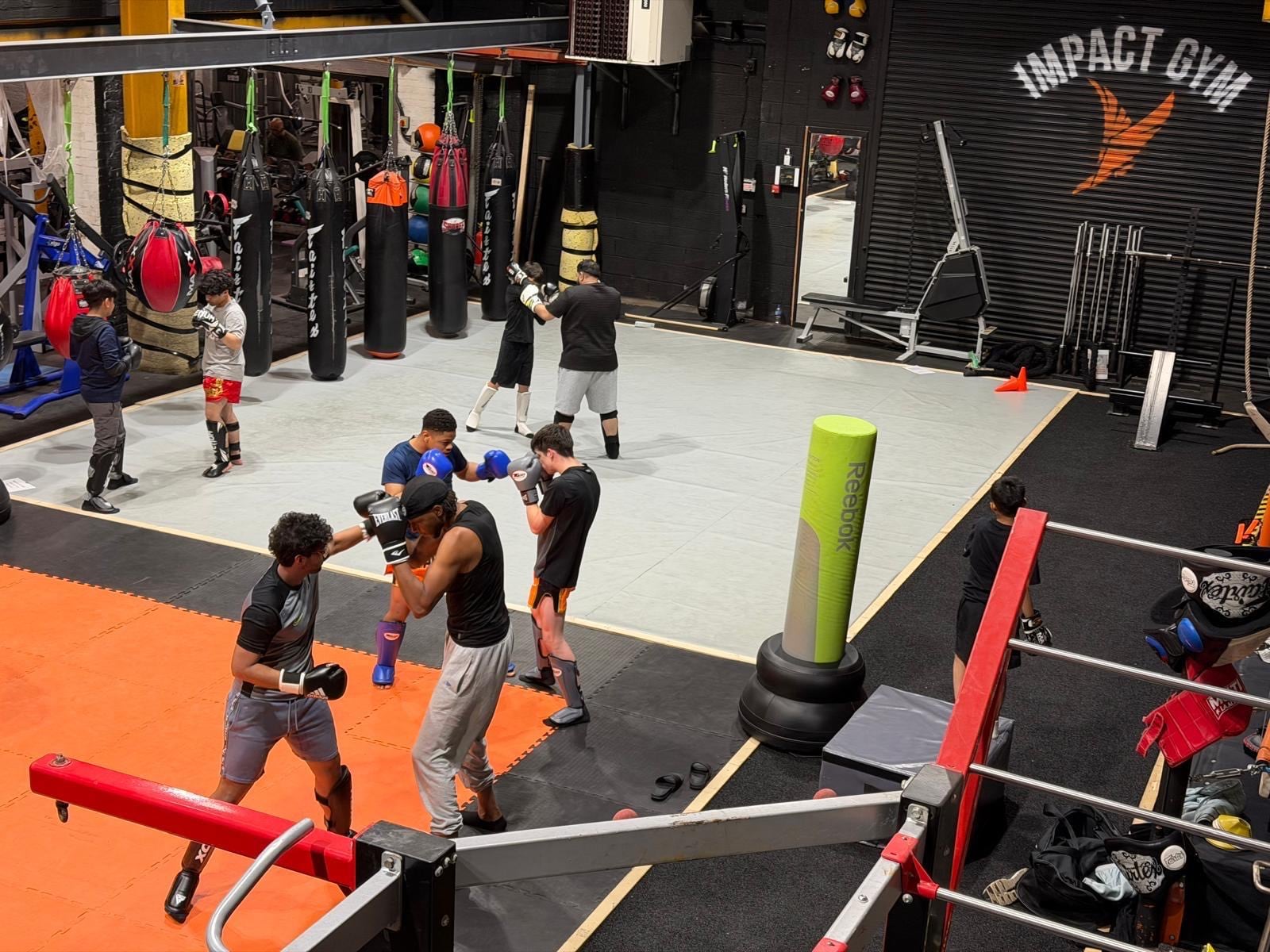Impact Gym Rochdale training floor in use